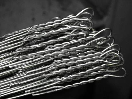 Many single loop bale tie wires.